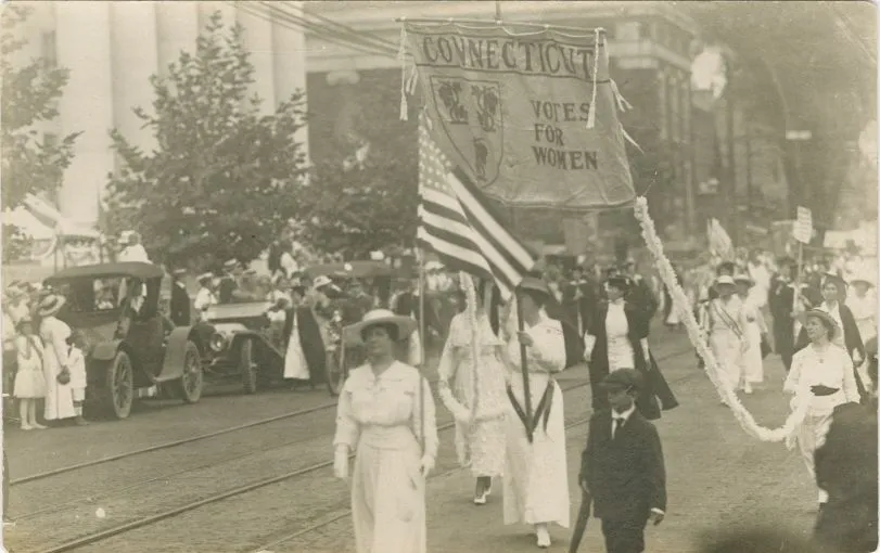 Suffragists marching with a 'Connecticut Votes for Women' banner